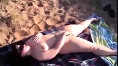 Mom Jenny masturbaties on a public beach - drtuber
