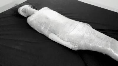 Mummified in plastic wrap girl gets fucked and squirts after fingering - anysex.com